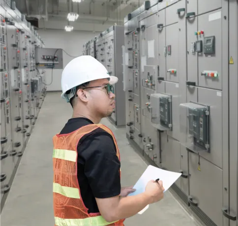 Montrelec engineer inspecting a switchgear lineup